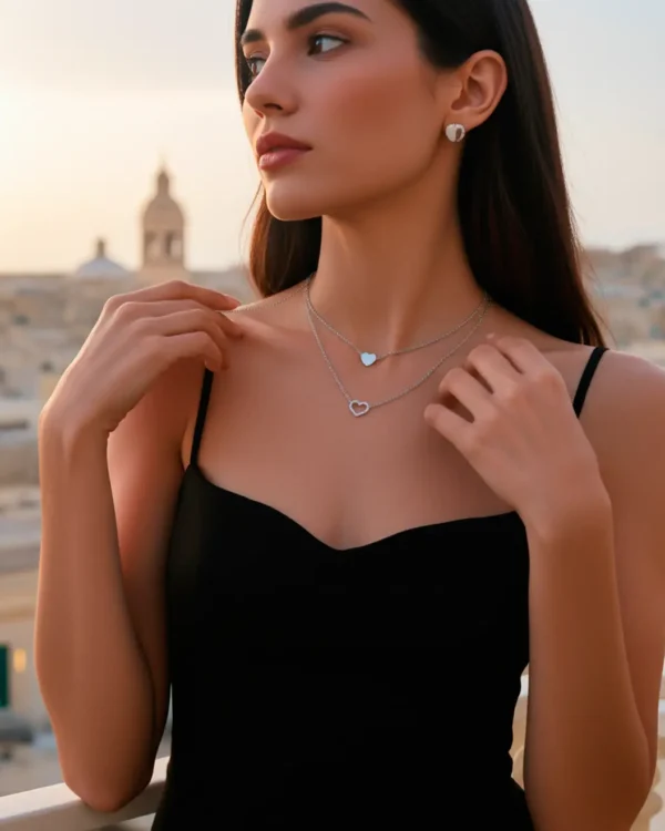 Silver double heart chain necklace worn with black dress Malta