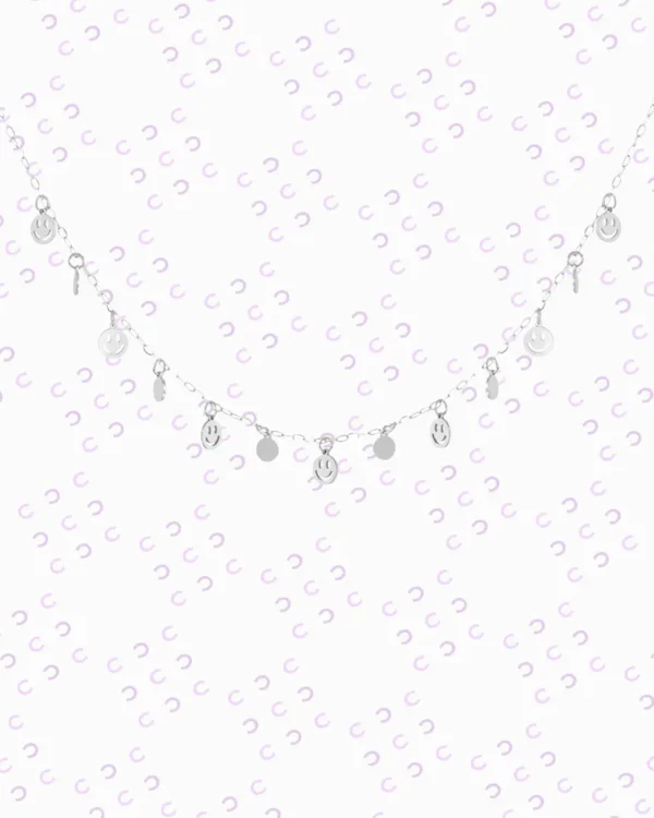 Woman wearing silver happy face necklace | stainless steel, waterproof, hypoallergenic jewelry from Cutu Store Malta