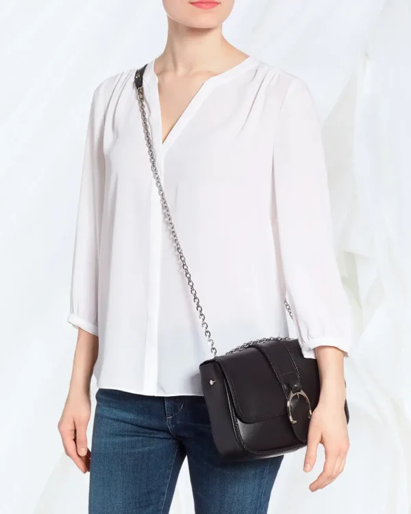 Longchamp small black leather crossbody bag worn on model