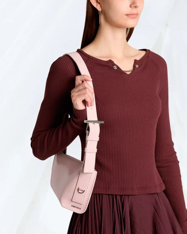 Alexander McQueen T-Bar Sling pink leather pouch worn on shoulder