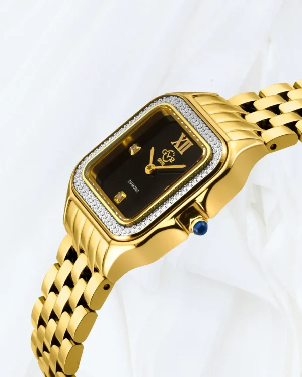 Side view of GV2 Milan women’s gold watch with black onyx dial, diamond bezel and blue cabochon crown in Malta.