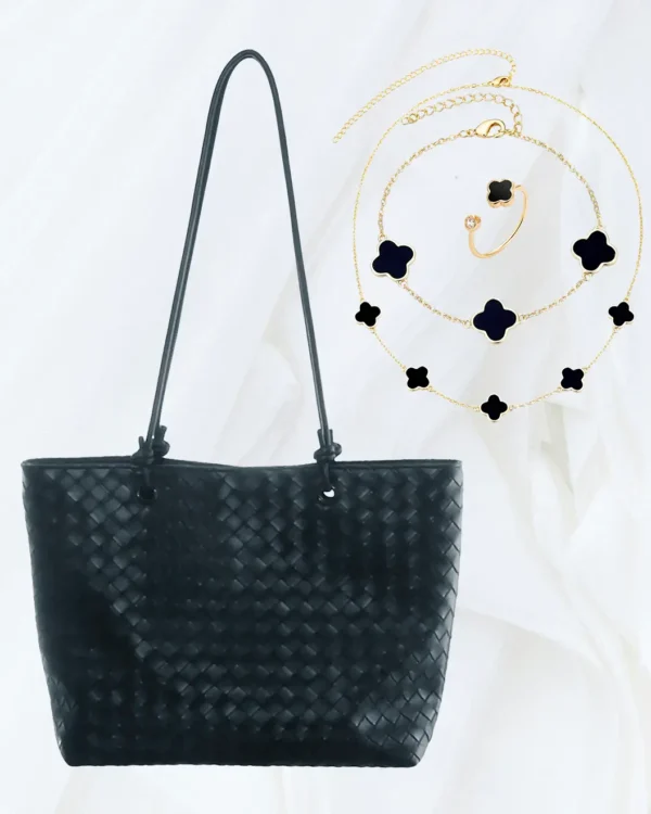 Adornia black woven faux leather tote with gold and black clover jewellery set