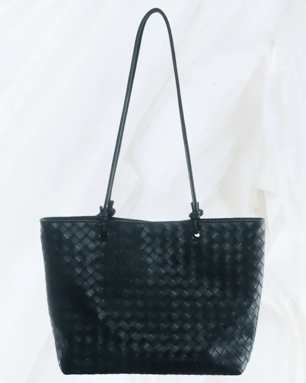 Adornia black woven faux leather tote front view