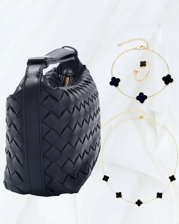 Adornia black woven faux leather crescent bag with gold and black clover jewellery