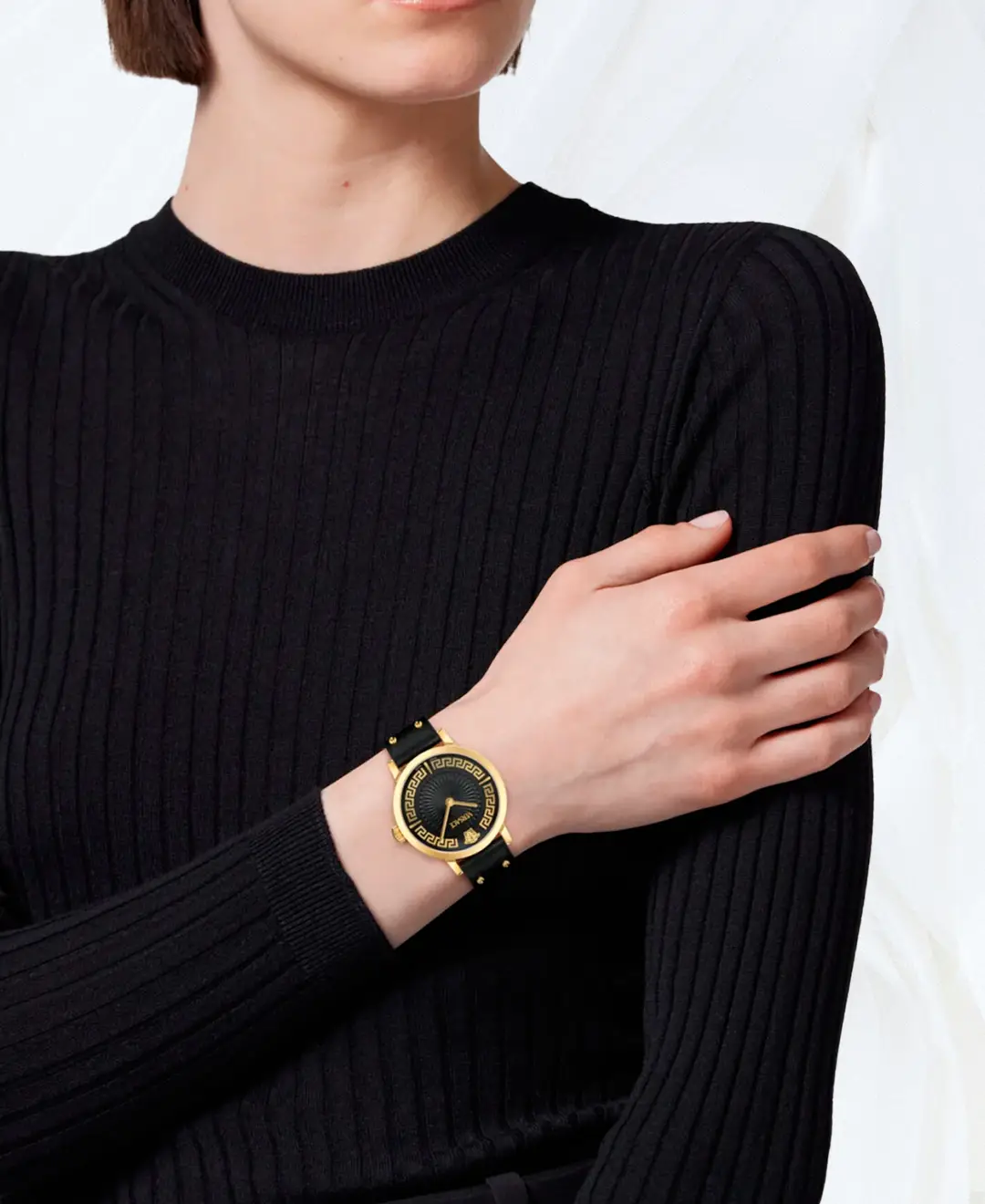 Versace Greca Chrono black leather watch worn on the wrist